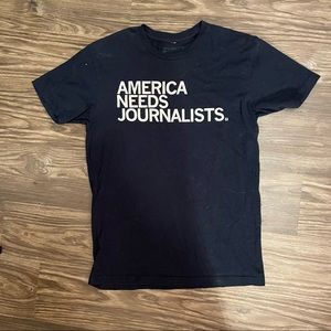 AMERICA NEEDS JOURNALISTS - IOWA LOCAL BRANDED TEE